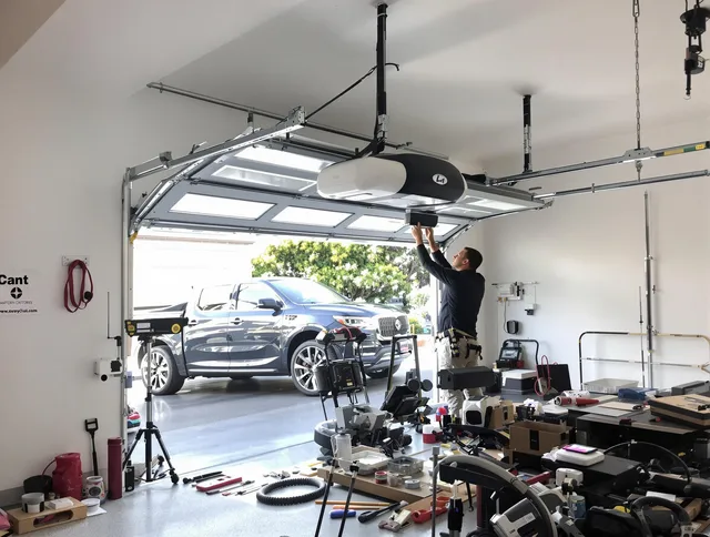 Eastlake Garage Door Repair specialist installing smart garage door opener system in Eastlake home