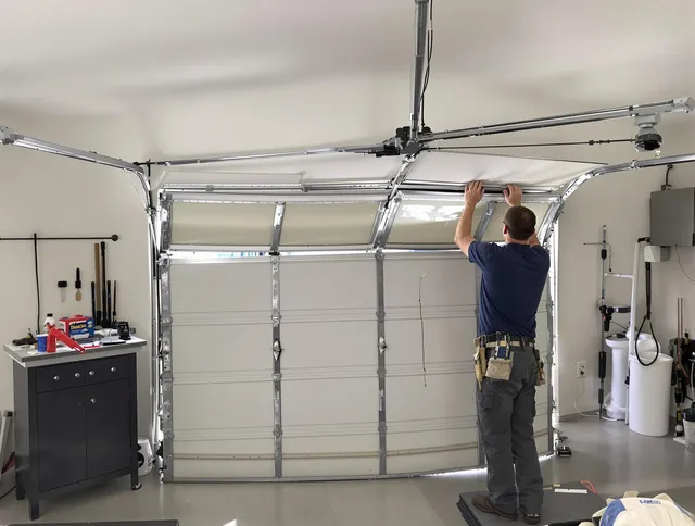 Eastlake Garage Door Repair specialist performing precise section replacement on Eastlake garage door