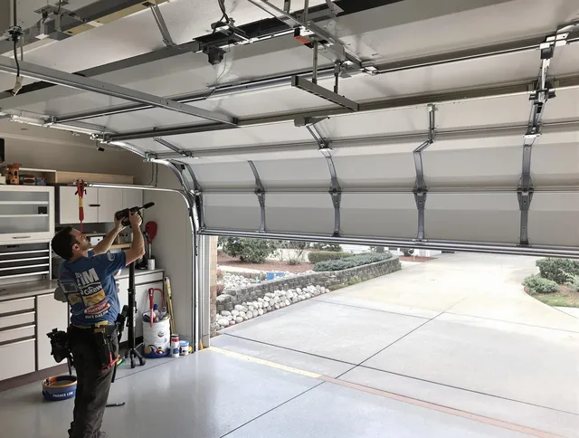 Garage door track repair service by Eastlake Garage Door Repair in Eastlake